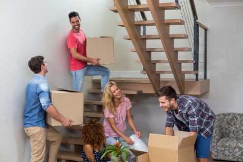 Removal team using safety procedures during a move