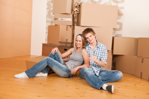 Careful handling of furniture during a flat move in Belsizepark