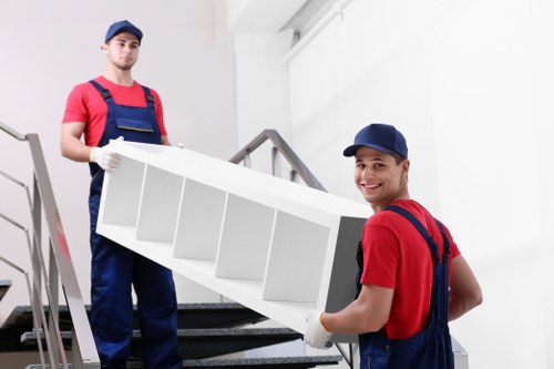Furniture pick-up service for a Belsizepark flat with bulky items ready for collection