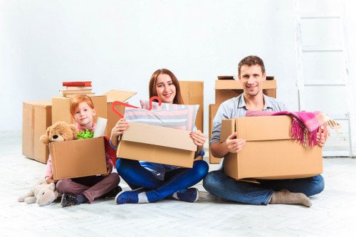 Moving truck service in Belsize Park with local residential street setting