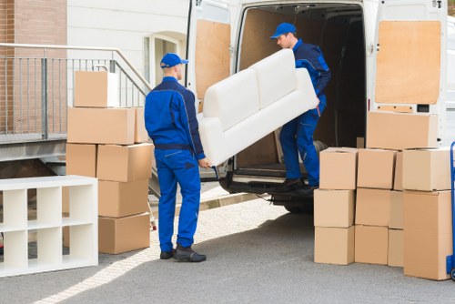 Commercial moving team planning an office relocation in Belsizepark