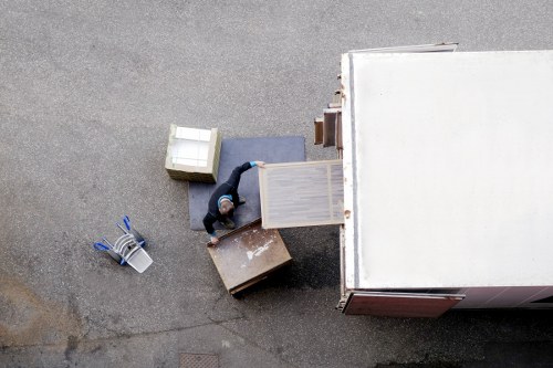 Charity donation items and recycling bags prepared during a removal