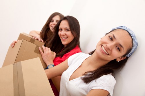 Packing boxes and furniture ready for a Belsizepark moving van
