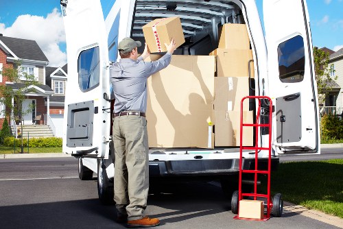 Careful loading of household furniture for removal services in Belsize Park