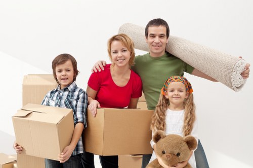 Customers reviewing booking details and quotation for removals service