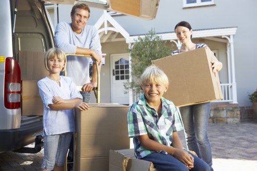 Professional movers packing household belongings for a Belsize Park relocation